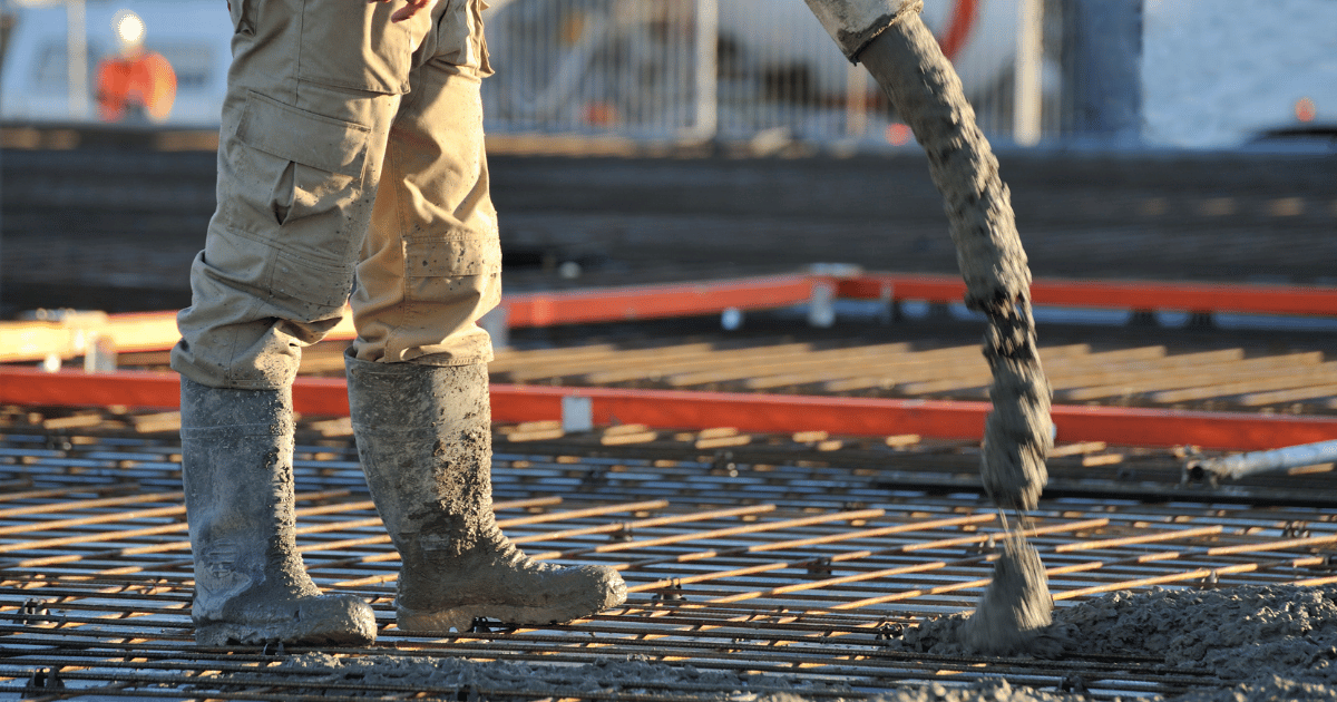 pouring concrete to a floor with Concrete Spacer (Aspros) below the reinforcing bars